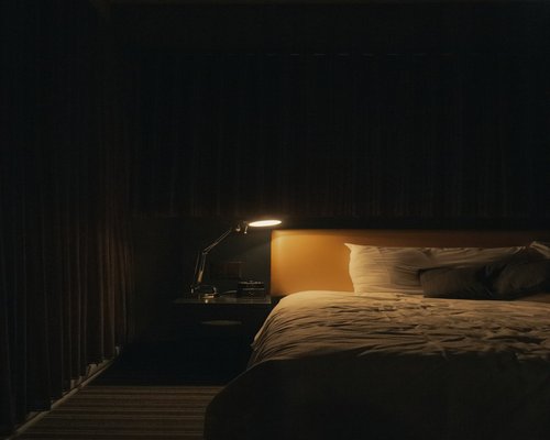 A calm bedroom prepared for a restful night